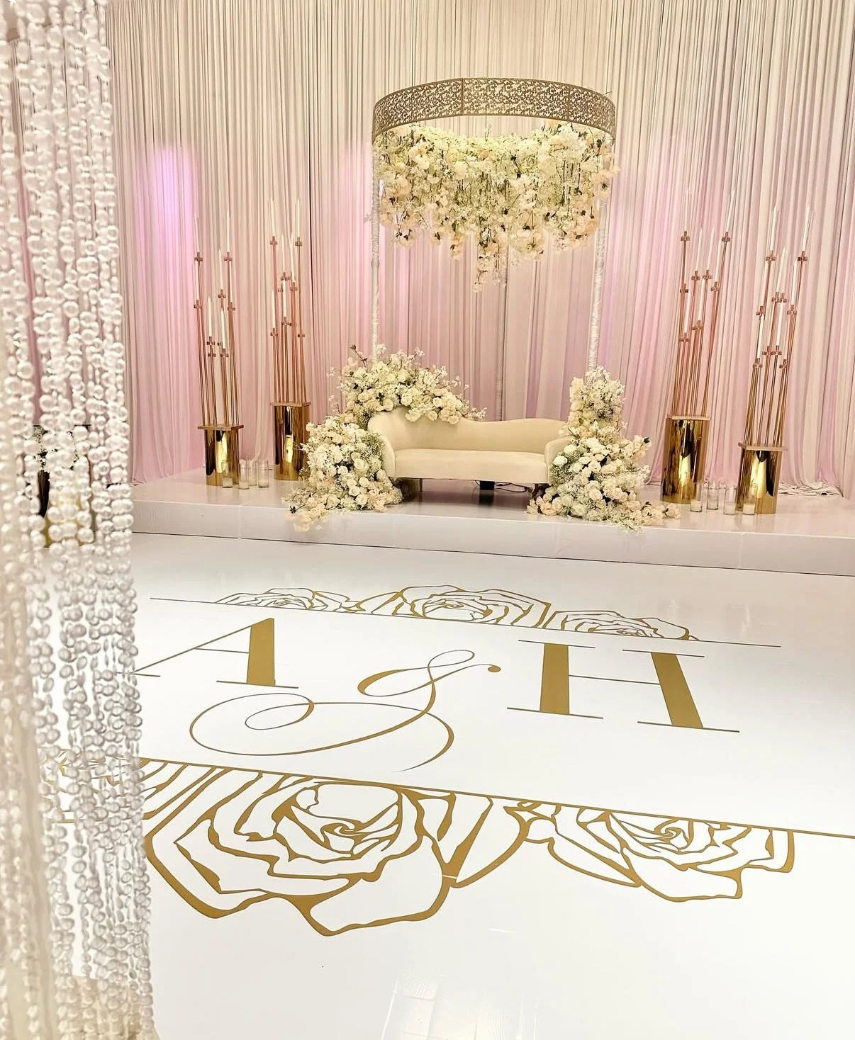 Monogram dance floor with floral artwork