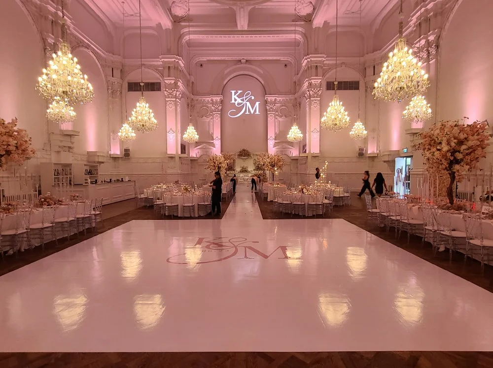 Ballroom aisle with a monogram dance floor