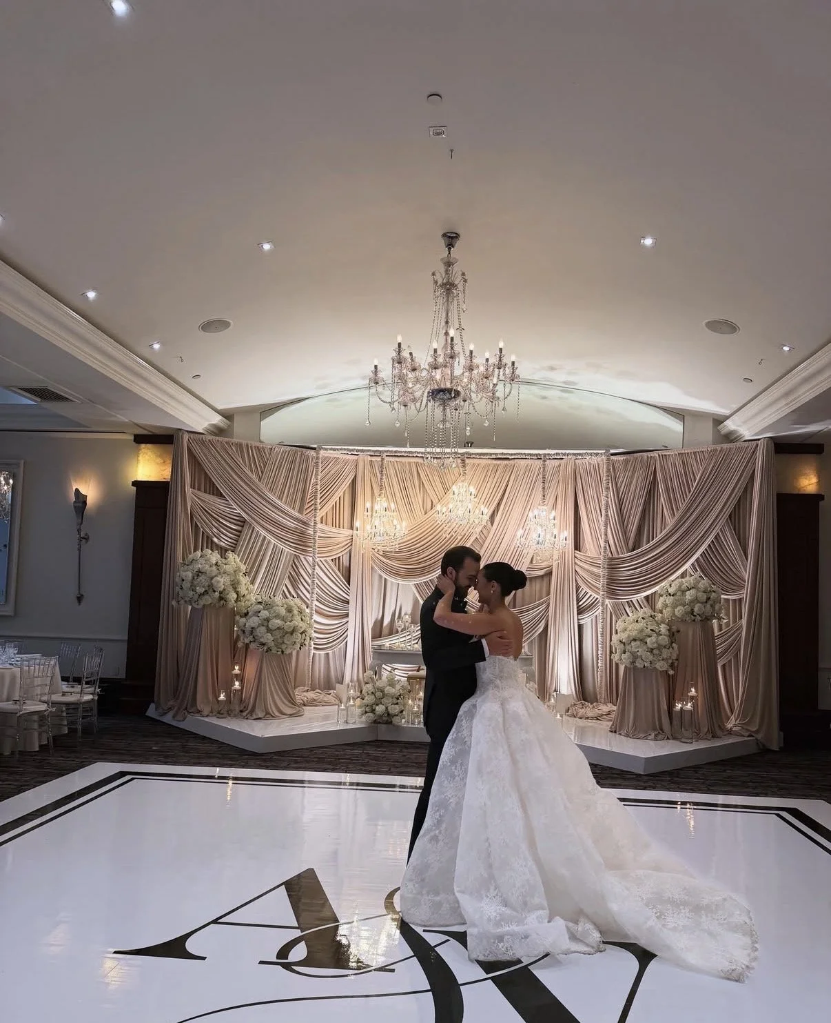 Couple embracing on their custom dance floor